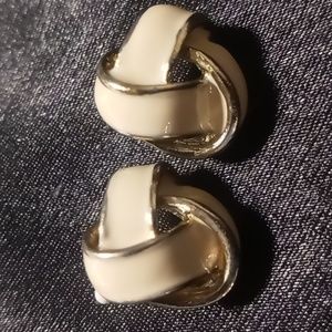 Vintage white enamel gold tone knots earrings.